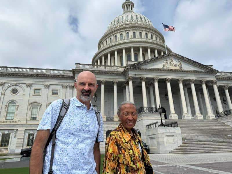 Partner-in-mission and Sr. Barbara in front of Congress during Advocacy day in 2025.