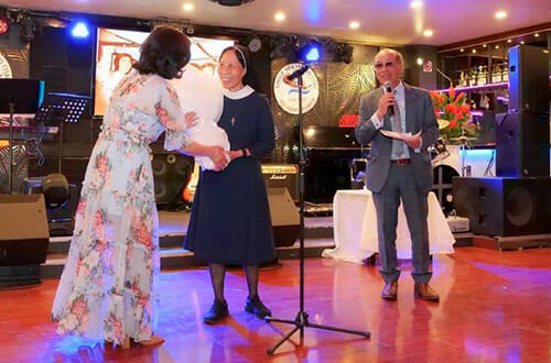 Sister Christine being honored at reunion banquet