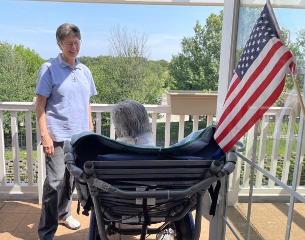 Sister Mary Carolyn on the patio with Sister Madeleine